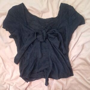 black short sleeve shirt with a bow in the front